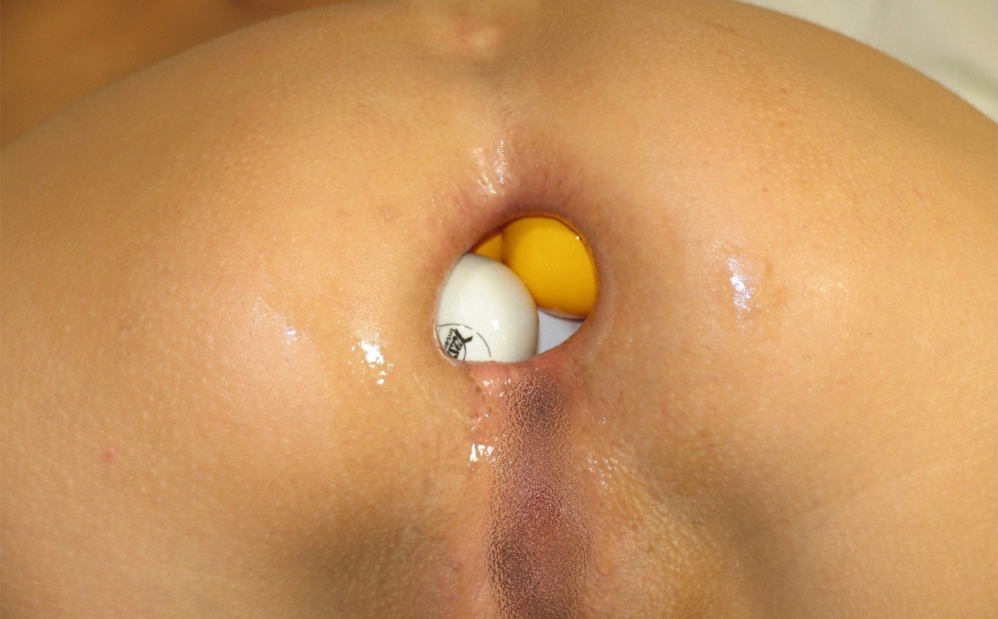 Putting baby oil in anus
