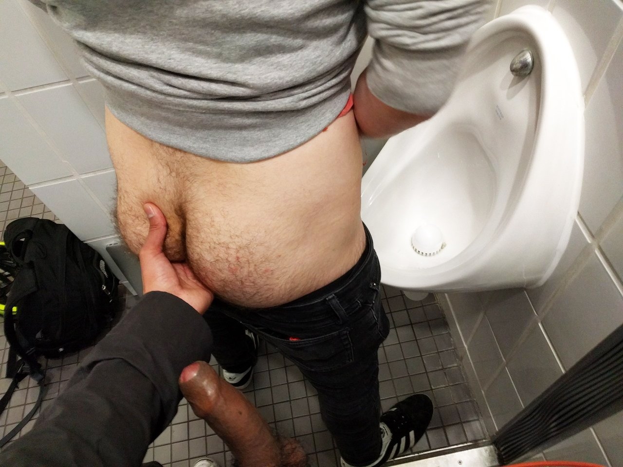 Pants down at urinal
